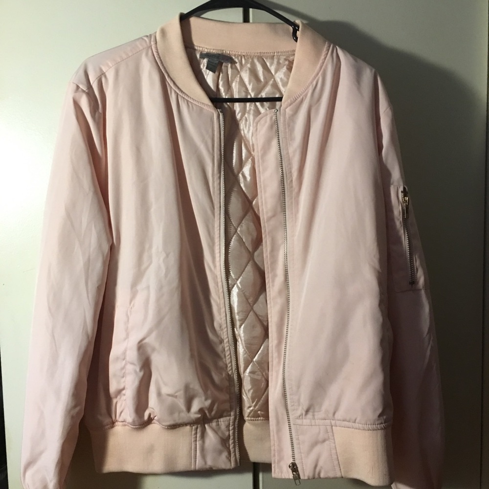 Baby pink bomber jacket.